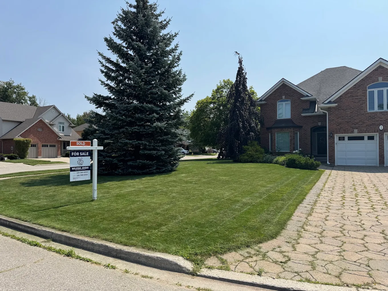 Lawn care and landscaping services in Guelph Ontario by A Cut Above Yard Services